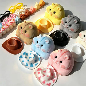 Generic Taba squishy hamster toy in hand demonstrates portable, travel-friendly squishiness.
