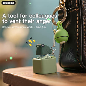 Generic Unwind Hub yellow frog keychain quacks clearly and lights up during use