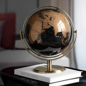 Generic World Globe with Rotating Stand in golden finish enhances a modern desk.