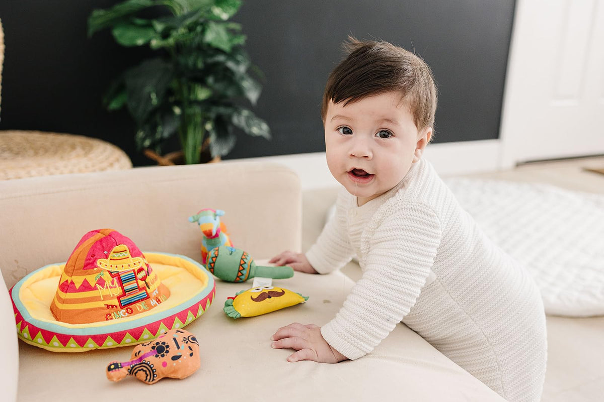 Genius Baby Toys pink donkey toy with squeak supports grip-and-release play