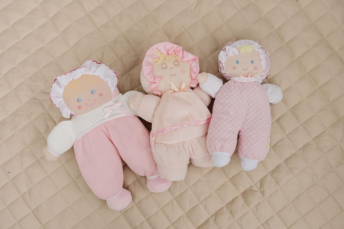 Genius Baby Toys soft doll face smile promotes friendly reassuring play moments.