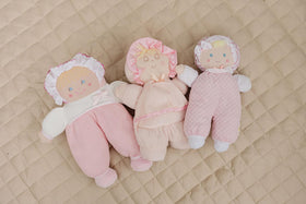 Genius Baby Toys soft doll face smile promotes friendly reassuring play moments.