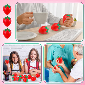 Geosar-strawberry-ball-in-hand demonstrates compact 2-inch size for easy handling.
