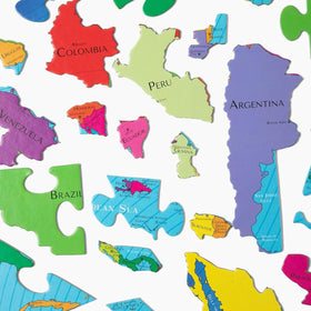 GeoToys GeoPuzzle family learning scene highlights shared geography exploration at home.