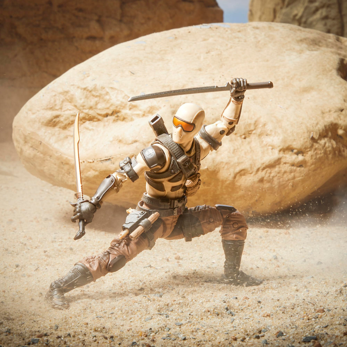 GI Joe Desert Commando Snake Eyes weapon accessory with suppressor.