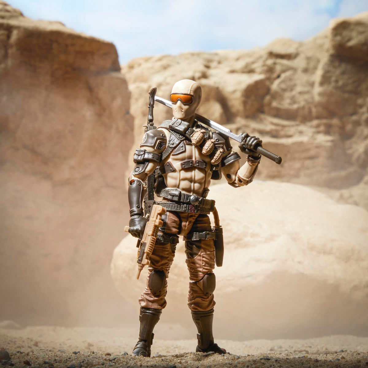 GI Joe Desert Commando Snake Eyes weapon accessory with suppressor detail.