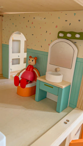 Giant bean storage box helps keep tiny furniture organized.