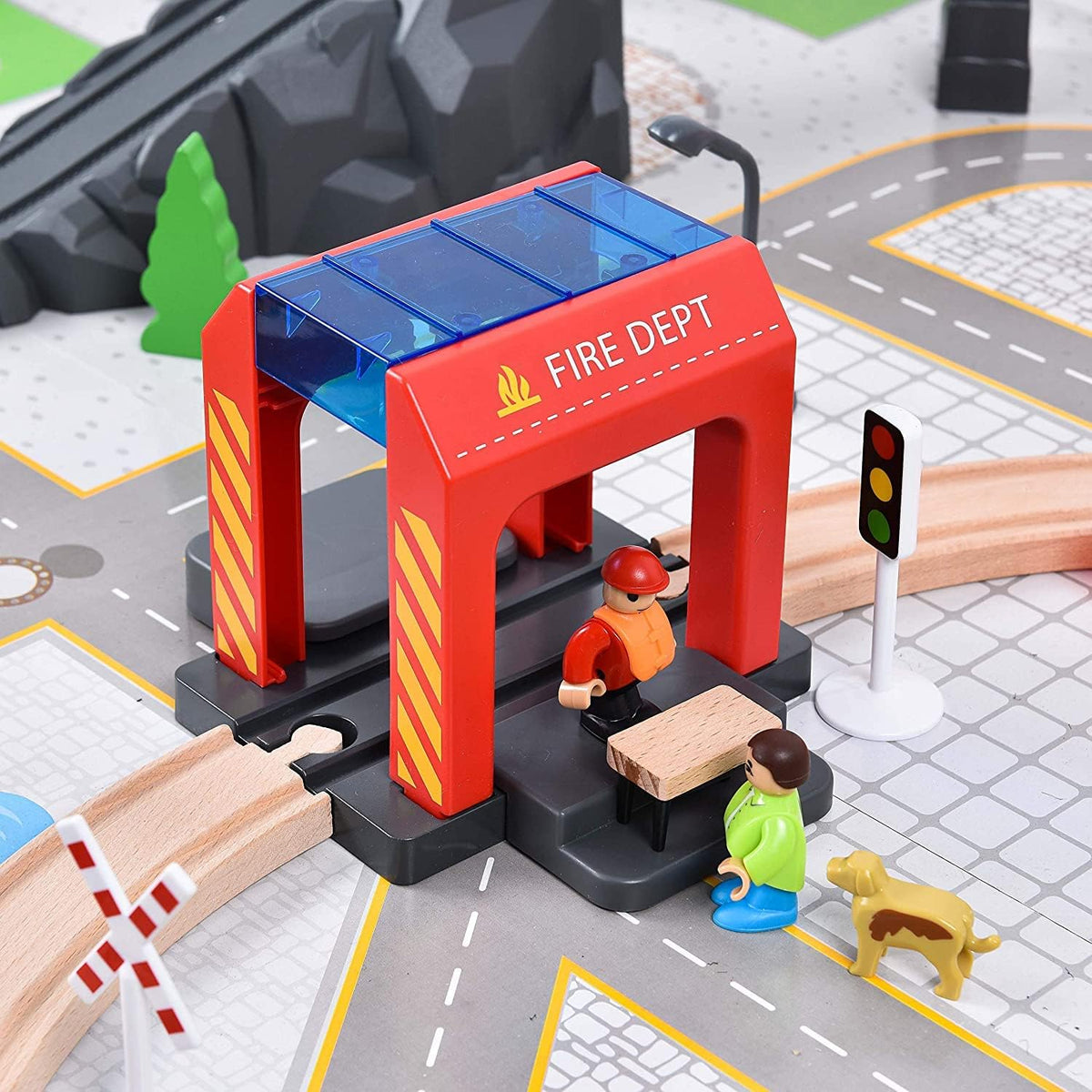 Giant Bean fire truck and wooden ambulance enhance rescue-themed pretend play.