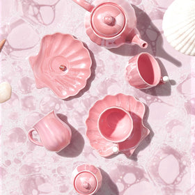 Giant Bean Porcelain Tea Set tea-time scene encourages imaginative play.