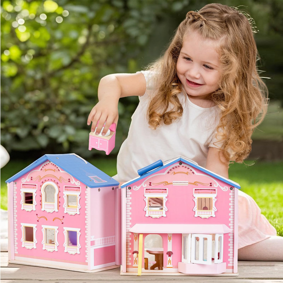 Giant bean two-story wooden dollhouse with included furniture and rooms.