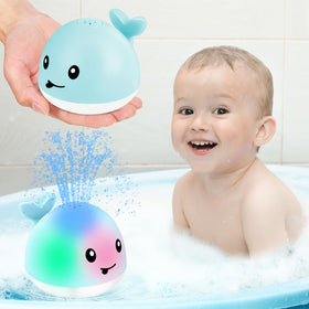 Gigilli light-up whale bath toy sprinkles water for engaging bath play.