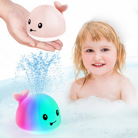 Gigilli whale bath toy sprinkler lights up bath time with color.
