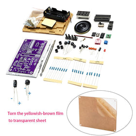 Gikfun FM Radio Kit on a workbench during soldering practice session.