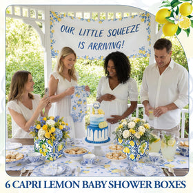 Baby shower setup using Capri lemon boxes as centerpieces.