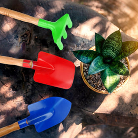 Gisafai rake blue helps smooth soil and tidy play areas