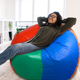 Glimin deflated rainbow ball stored compactly after use.