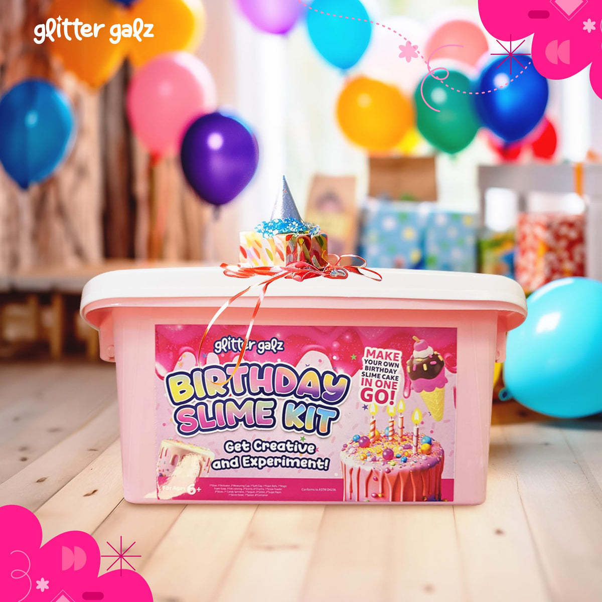 Glitter Galz birthday setup with slime activity and party favors.