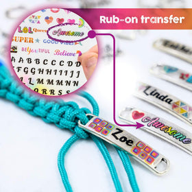 Glittery Garden transfer sheet graphics used to decorate metal pendants