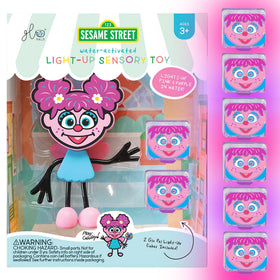 Glo Pals Julia character with light-up cubes in the main box for easy gifting.
