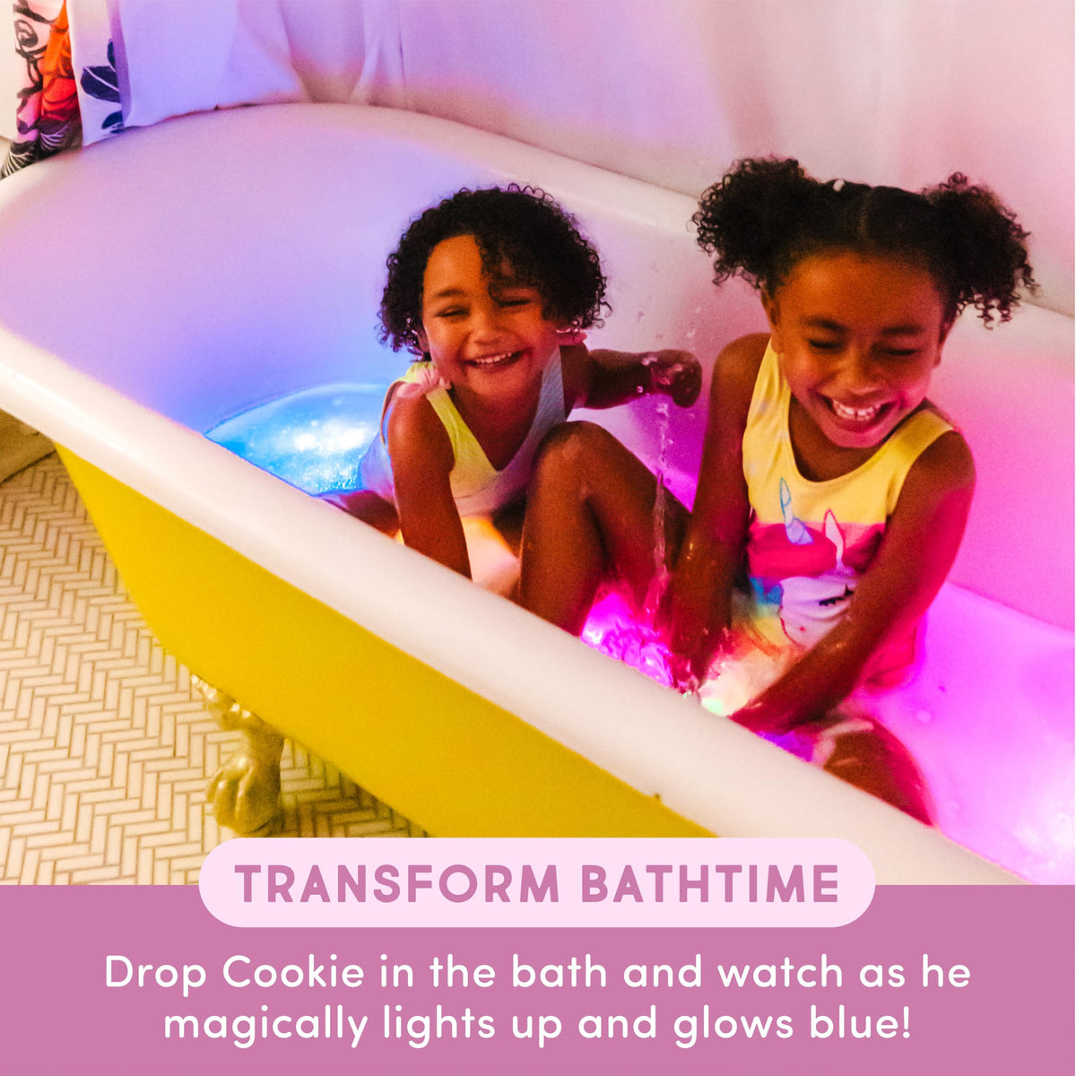 Glo Pals orange light-up cubes illuminate bath time, aiding color recognition.