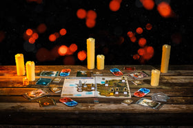 Gloomhaven Jaws of the Lion miniatures on table showcase four mercenaries in action