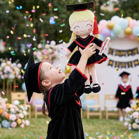 Class of 2026 keepsake photo prop featuring Gloveleya graduation doll.