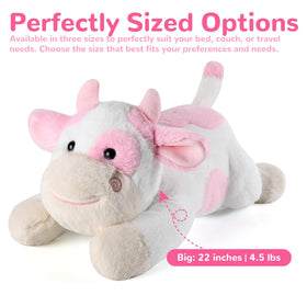 Gnomantic cow weighted stuffed animal, sleeping pose, promotes a relaxing bedtime routine.
