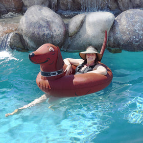 GoFloats Wiener Dog Party Tube with kids using it for water play
