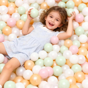 GOGOSO balls shown with toddler play for imaginative discovery.