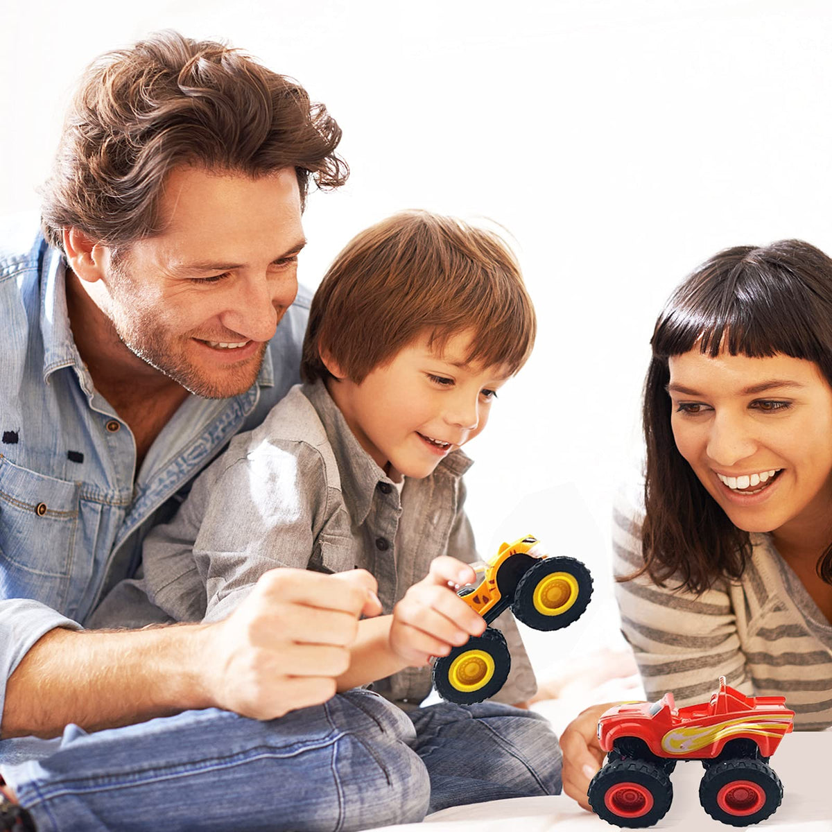 GOLDINPOT kids playing pretend with monster trucks fosters social and sensory play.