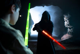 Goliath Power Saber green LED lighting for immersive play.