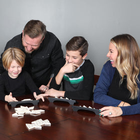 Goliath Pressman Tri-Ominos family-friendly setup for 2-4 players