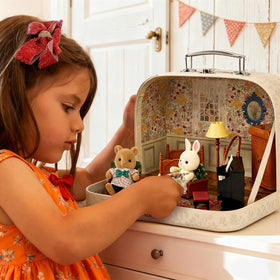 Golray dollhouse suitcase floor lamp completes a cozy, imaginative playroom.