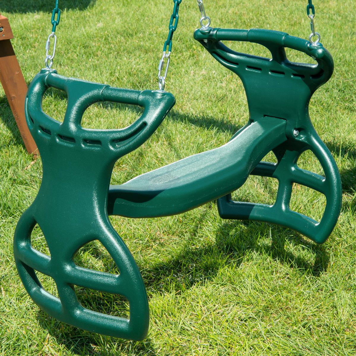 Gorilla Playsets tandem-seat glider swing green, two-child sharing a ride