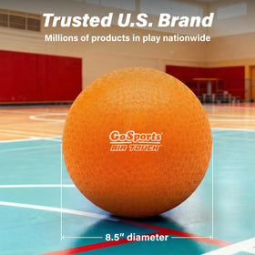 Kids enjoy kickball outdoors with GoSports balls.