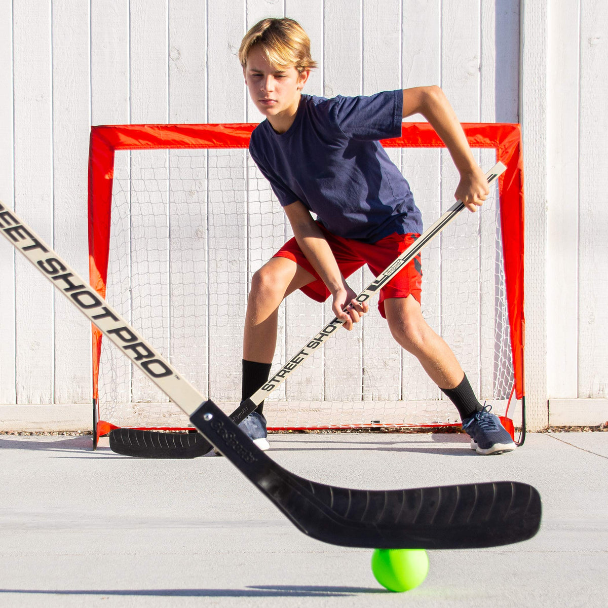 GoSports street hockey set balls included for quick practice sessions