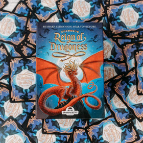 Grandpa Beck's Dragons Reign art and cards support easy family play.