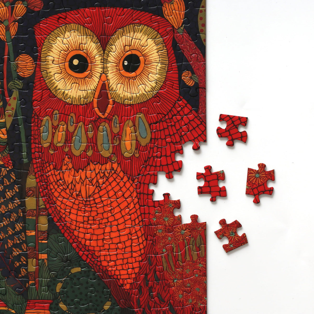 Graphinee Owl Puzzle embossed texture close-up showing premium craftsmanship