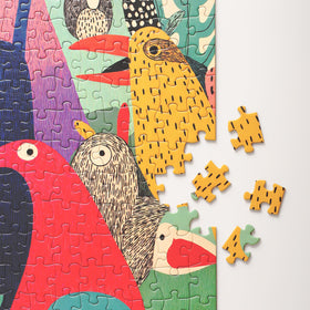 Graphinee vibrant tropical bird design with bold colors and geometric shapes for lively decor.