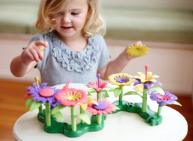 Green Toys Build-a-Bouquet flower pieces in vibrant colors for imaginative arrangements.