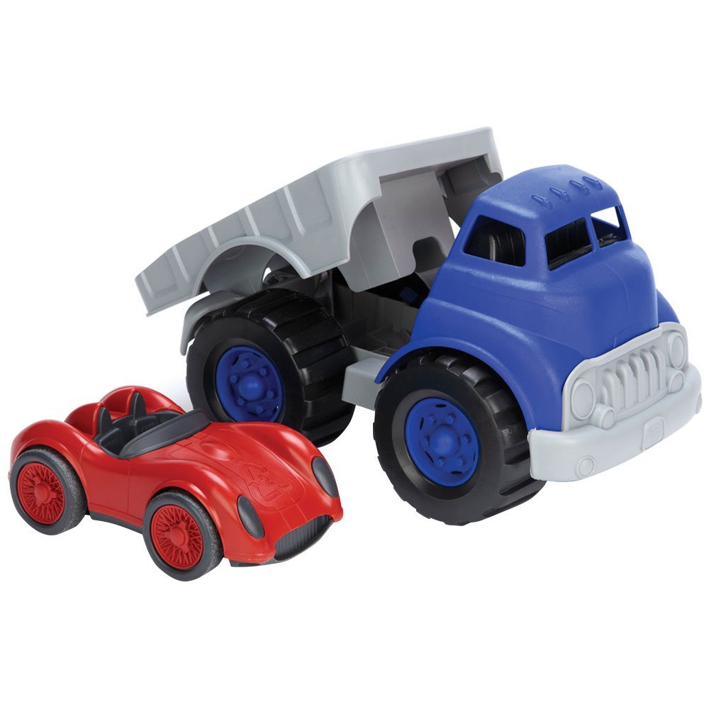 Green Toys flatbed truck blue-grey side view, promotes imaginative hauling play.