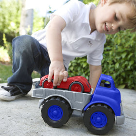 Green Toys race car red side view, vibrant design supports creative racing games.