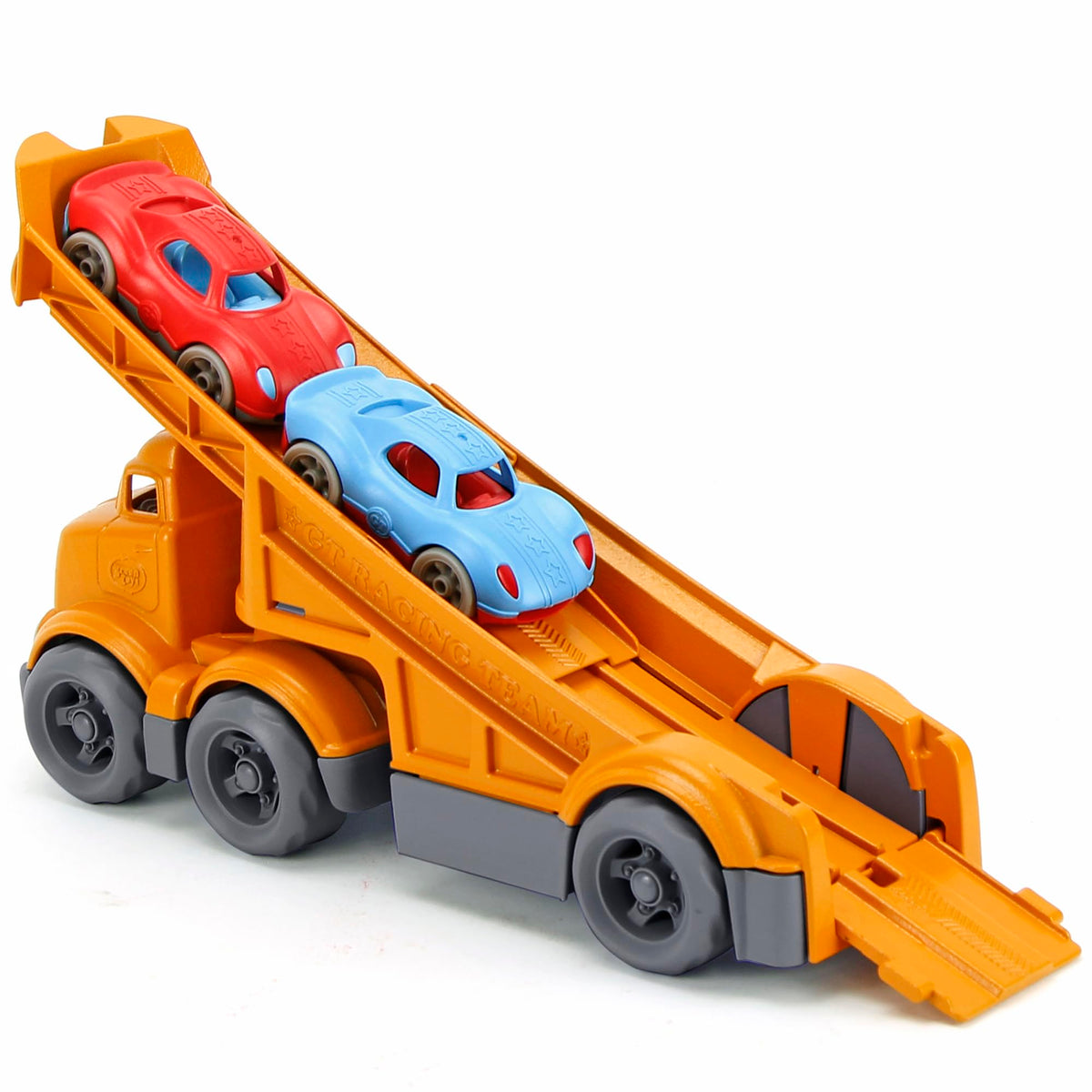 Green Toys racing truck and racers on a play mat for active play.