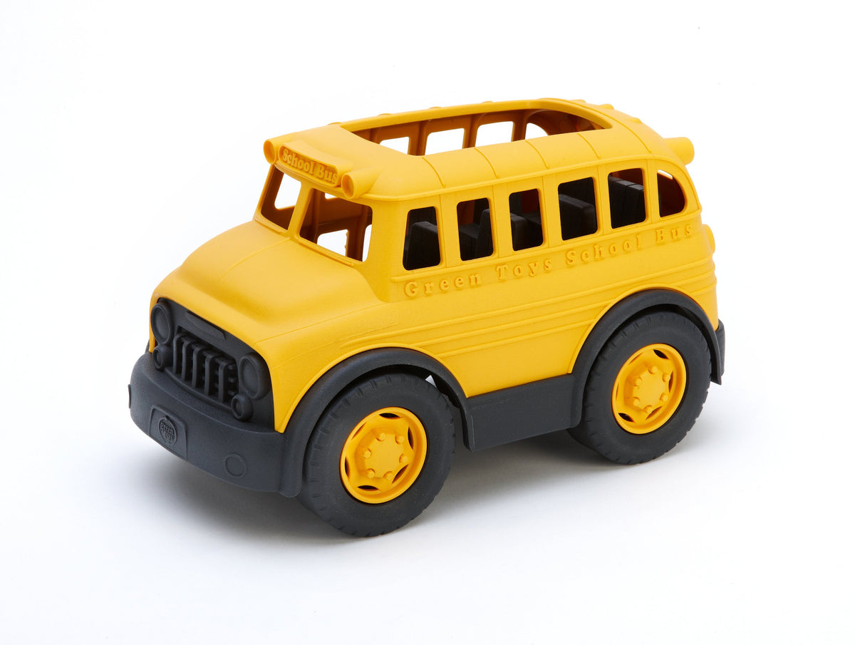 Green Toys School Bus Yellow dashboard with dials for imaginative roleplay.