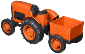 Green Toys Tractor CB Orange with trailer demonstrates detachable trailer for harvest play.
