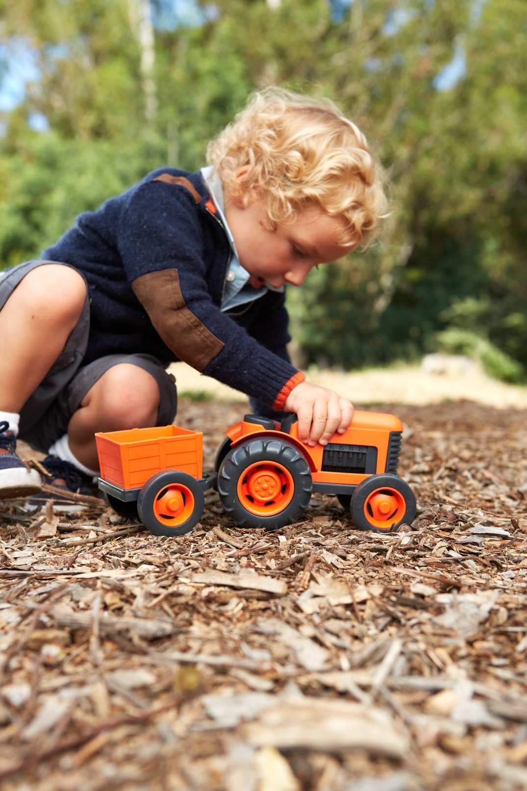 Green Toys Tractor orange dishwasher-safe finish for easy cleanup after play.