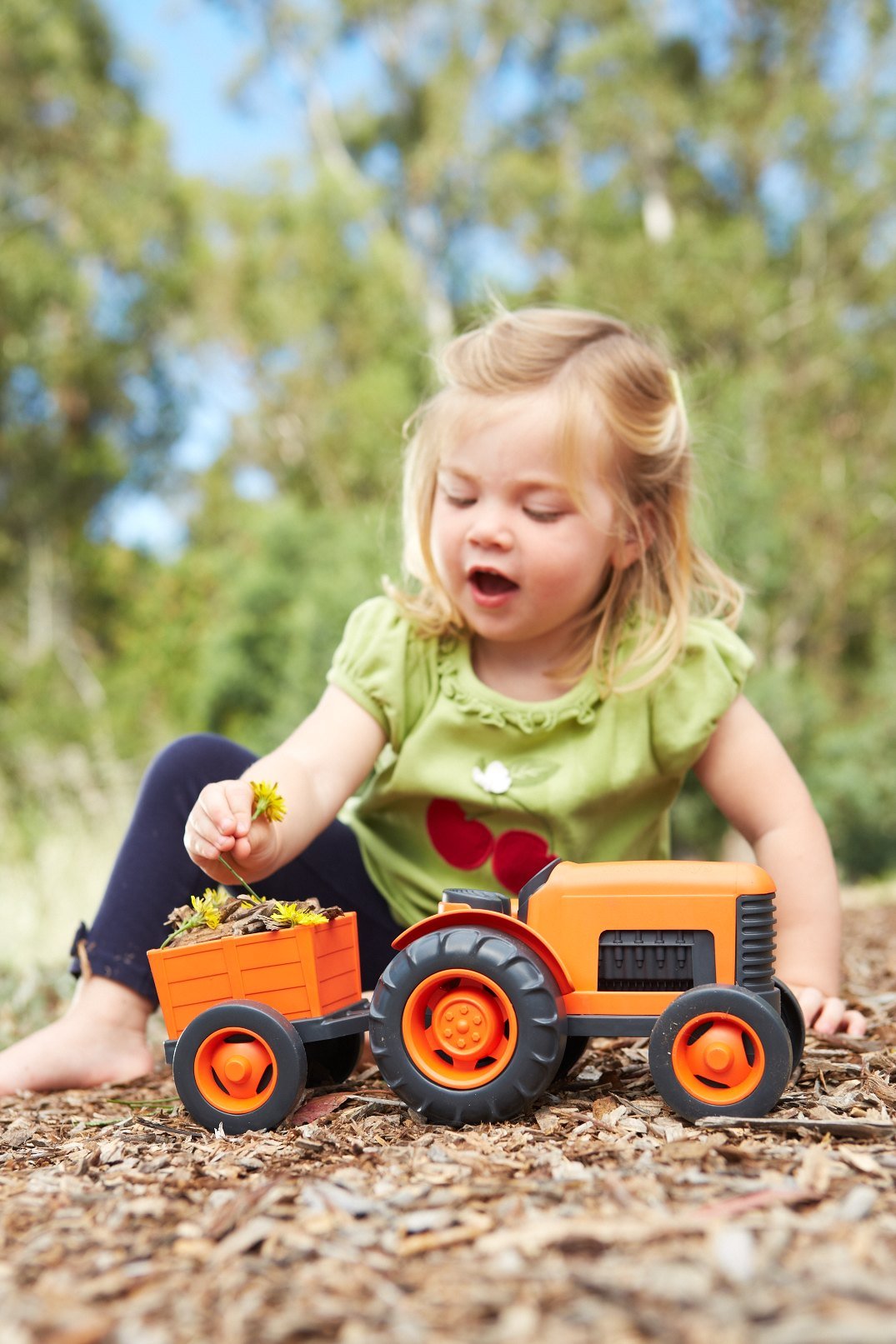 Green Toys Tractor orange side view highlighting durable, rust-free design.