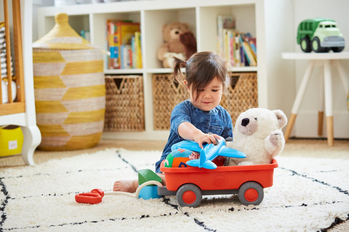 Green Toys Wagon Orange ready for beach or backyard adventures with no metal parts.