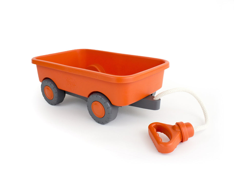 Green Toys Wagon Orange with chunky tires for stable indoor and outdoor transport.