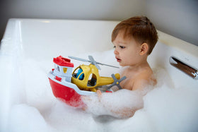 Green Toys Rescue Boat water-play scene highlights safe, recycled plastic construction.